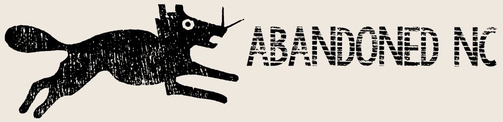 A stylized illustration of a black, leaping wolf with a prominent snout and large ears, next to the text 'ABANDONED NC' in a distressed font.